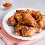 cosce di pollo nella friggitrice ad aria